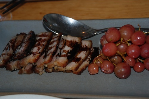 Drool inducing sauteed pork and grapes with hoisin sauce; salty, savory sliced pork paired with bursting fruit is a winner every time (photo: Marina Cohn)