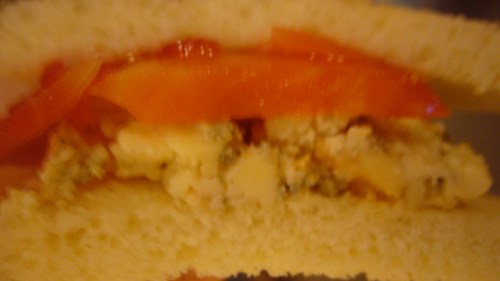 Ringo's Amuse A simple amuse of grilled bread, fresh sliced heirloom tomato and a sharp, soft blue cheese