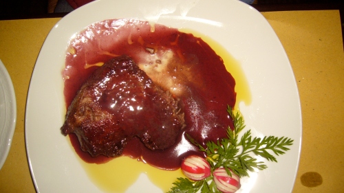 Grilled steak in a sweet red wine reduction sauce