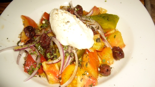 A new style greek salad comes together with Marinated Heirloom Tomato, Feta Mousse, Red Onion and Olives.  The creamy, sorbet-like feta mousse balances the sharpness of the olives.