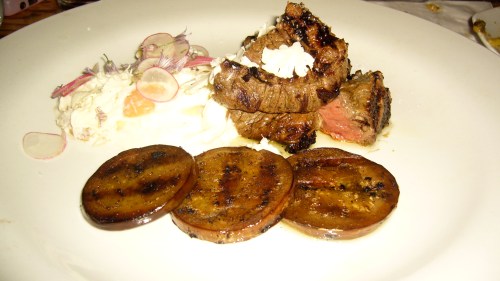 Beef Tenderloin and Smoked Eggplant with Goat Cheese, Shallots, Chive Flower and Radish is Chef Ludo at his finest.  The beef, a perfect medium rare, explodes with char-grilled flavors, only enhanced by the smokeyness of the eggplant.  The goat cheese and carmelized shallots combine to taste like a fully loaded backed potato without the potato.  This is definately one of LA's best beef dishes.